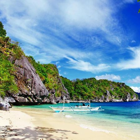 Mbg Travellers Inn Powered By Cocotel Puerto Princesa Ngoại thất bức ảnh