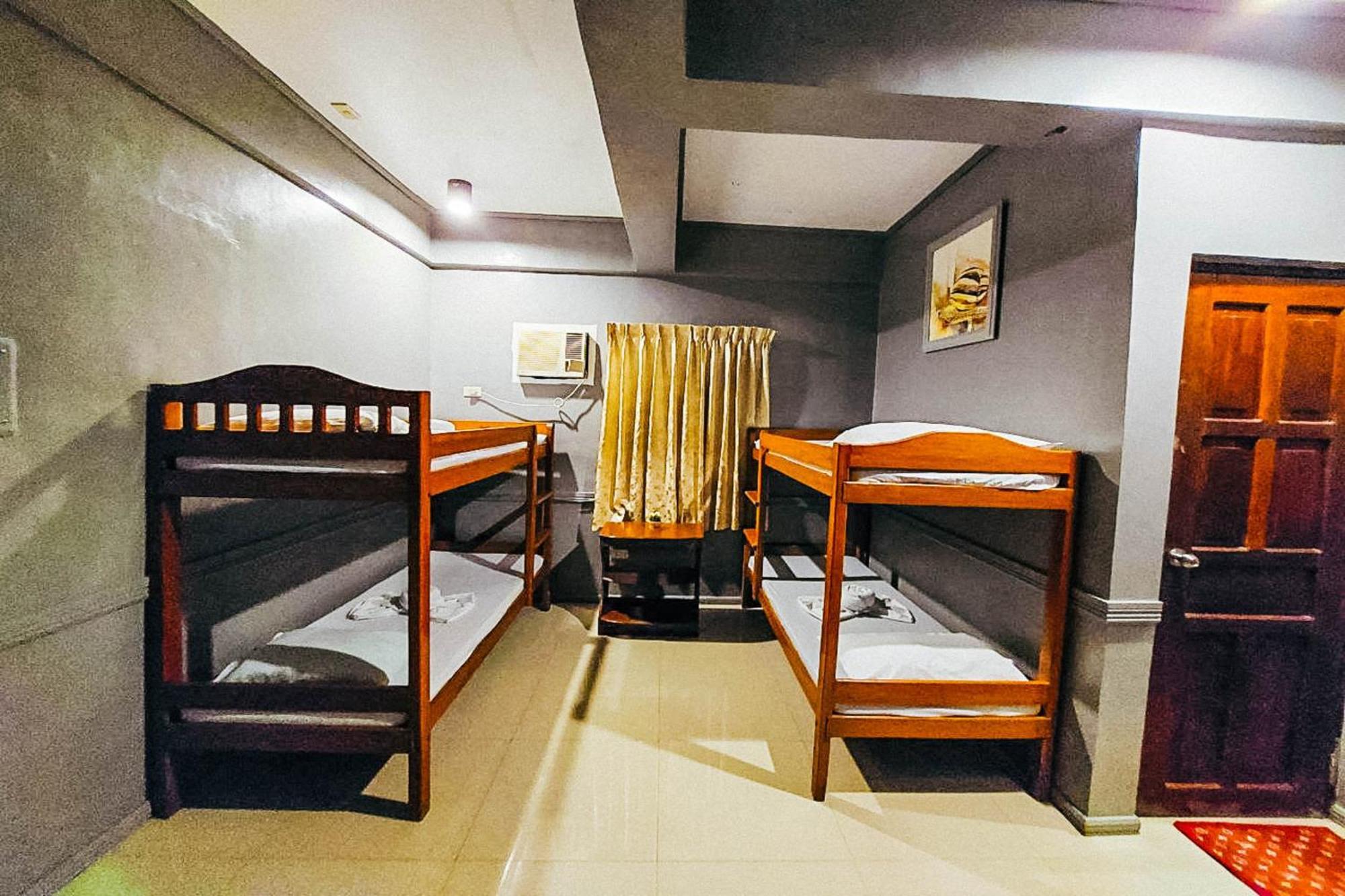 Mbg Travellers Inn Powered By Cocotel Puerto Princesa Phòng bức ảnh