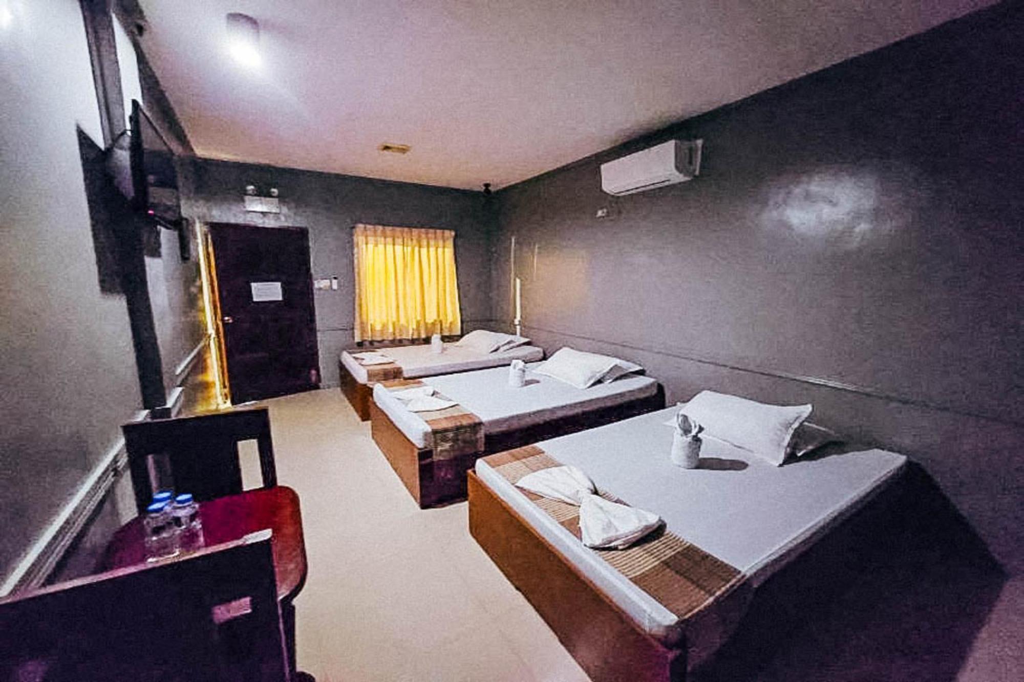 Mbg Travellers Inn Powered By Cocotel Puerto Princesa Phòng bức ảnh