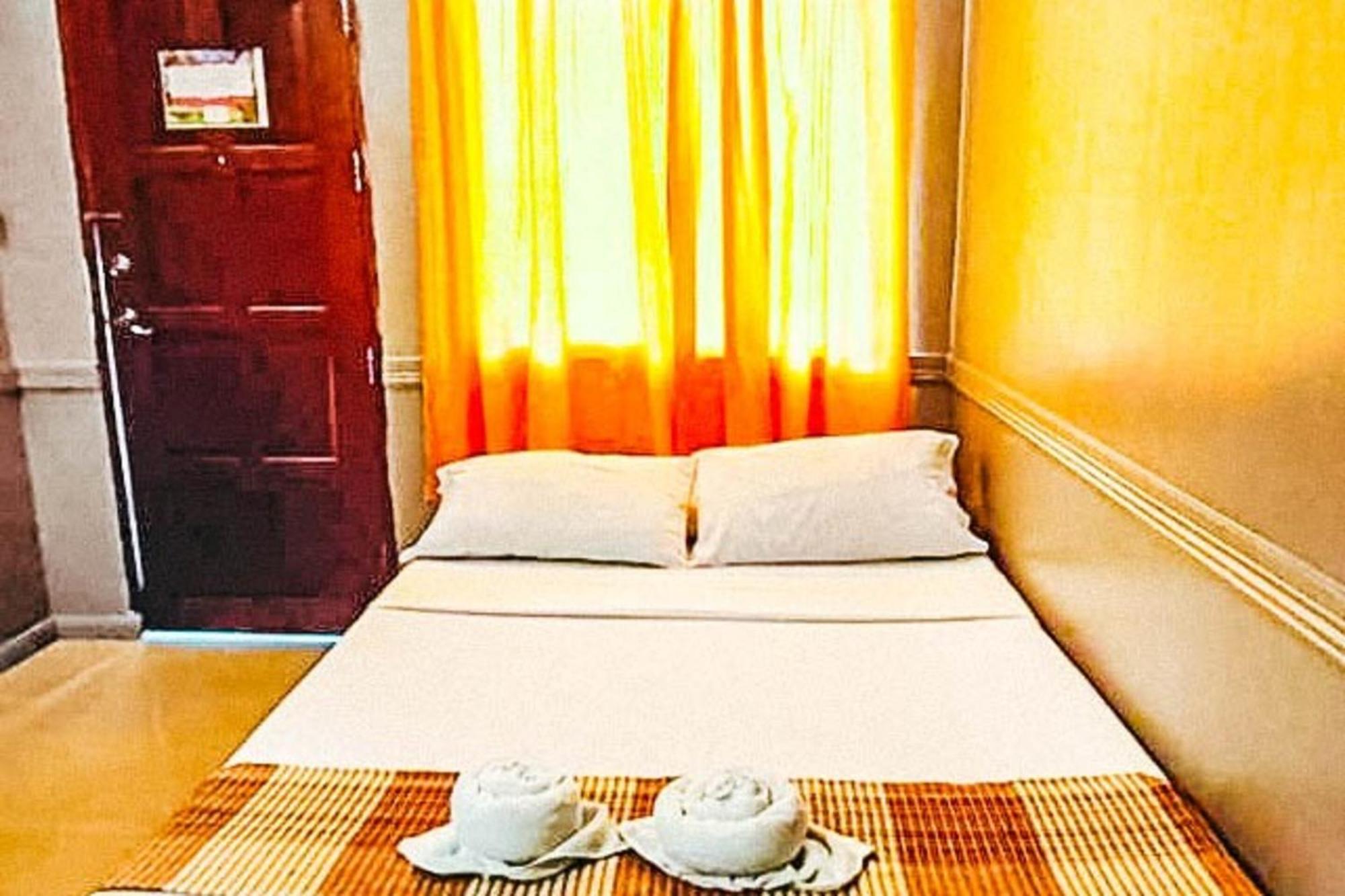 Mbg Travellers Inn Powered By Cocotel Puerto Princesa Phòng bức ảnh