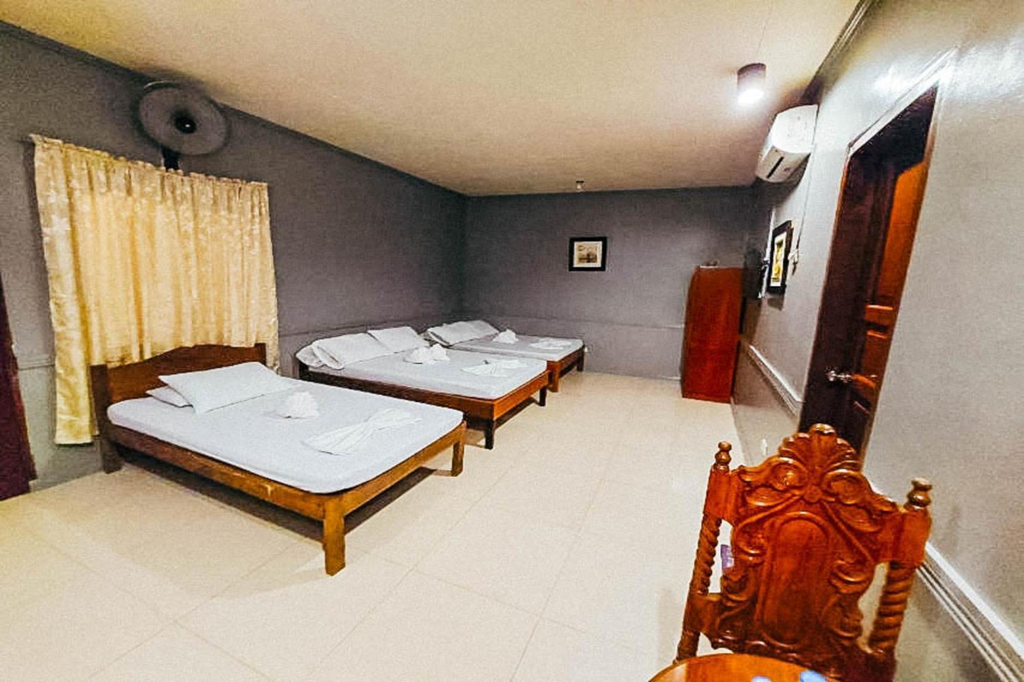 Mbg Travellers Inn Powered By Cocotel Puerto Princesa Phòng bức ảnh