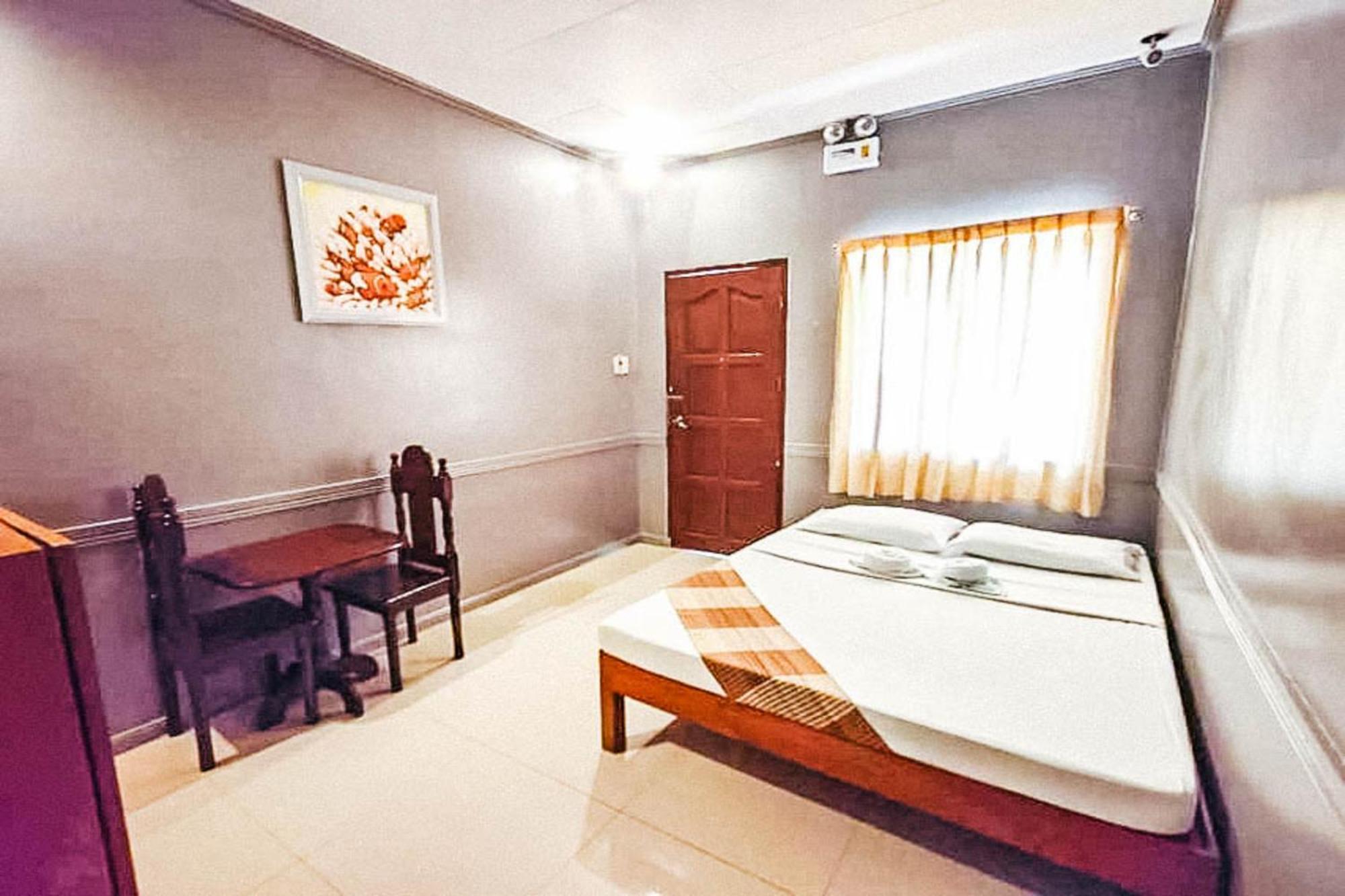 Mbg Travellers Inn Powered By Cocotel Puerto Princesa Phòng bức ảnh