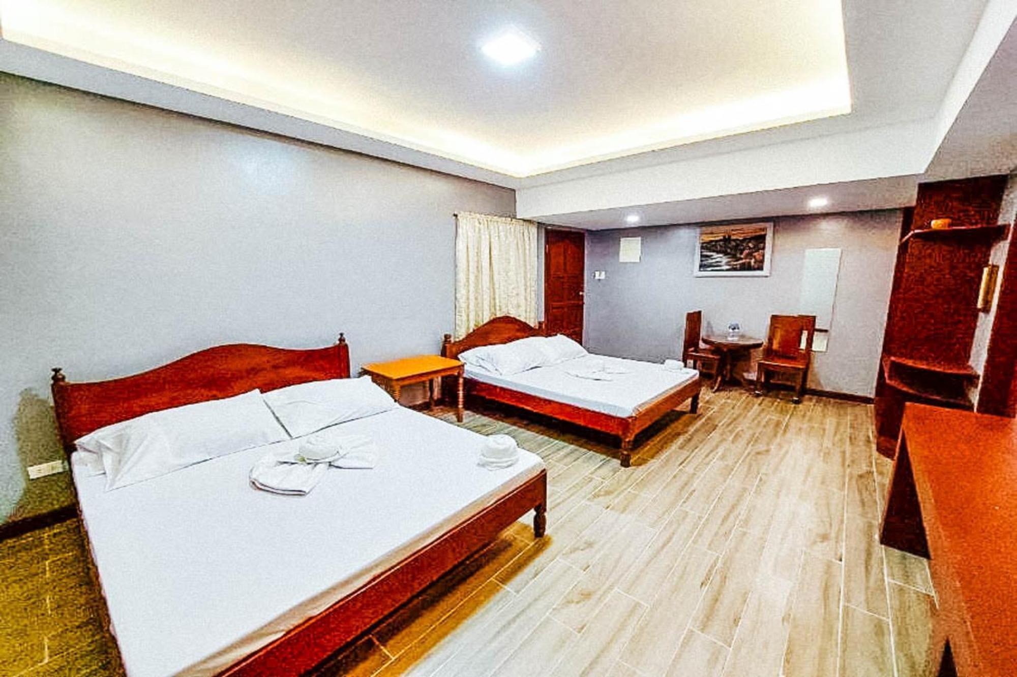 Mbg Travellers Inn Powered By Cocotel Puerto Princesa Phòng bức ảnh