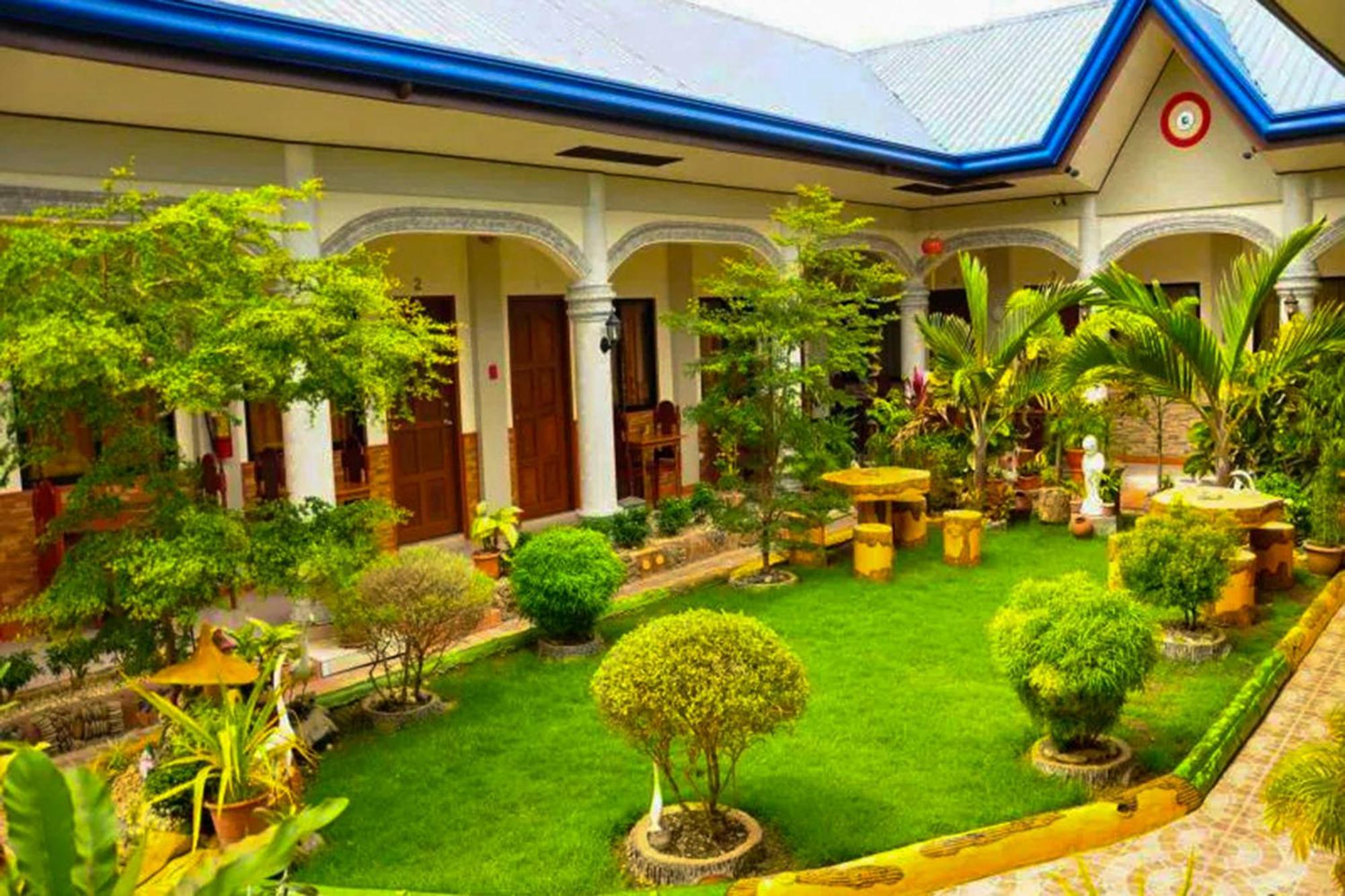 Mbg Travellers Inn Powered By Cocotel Puerto Princesa Ngoại thất bức ảnh