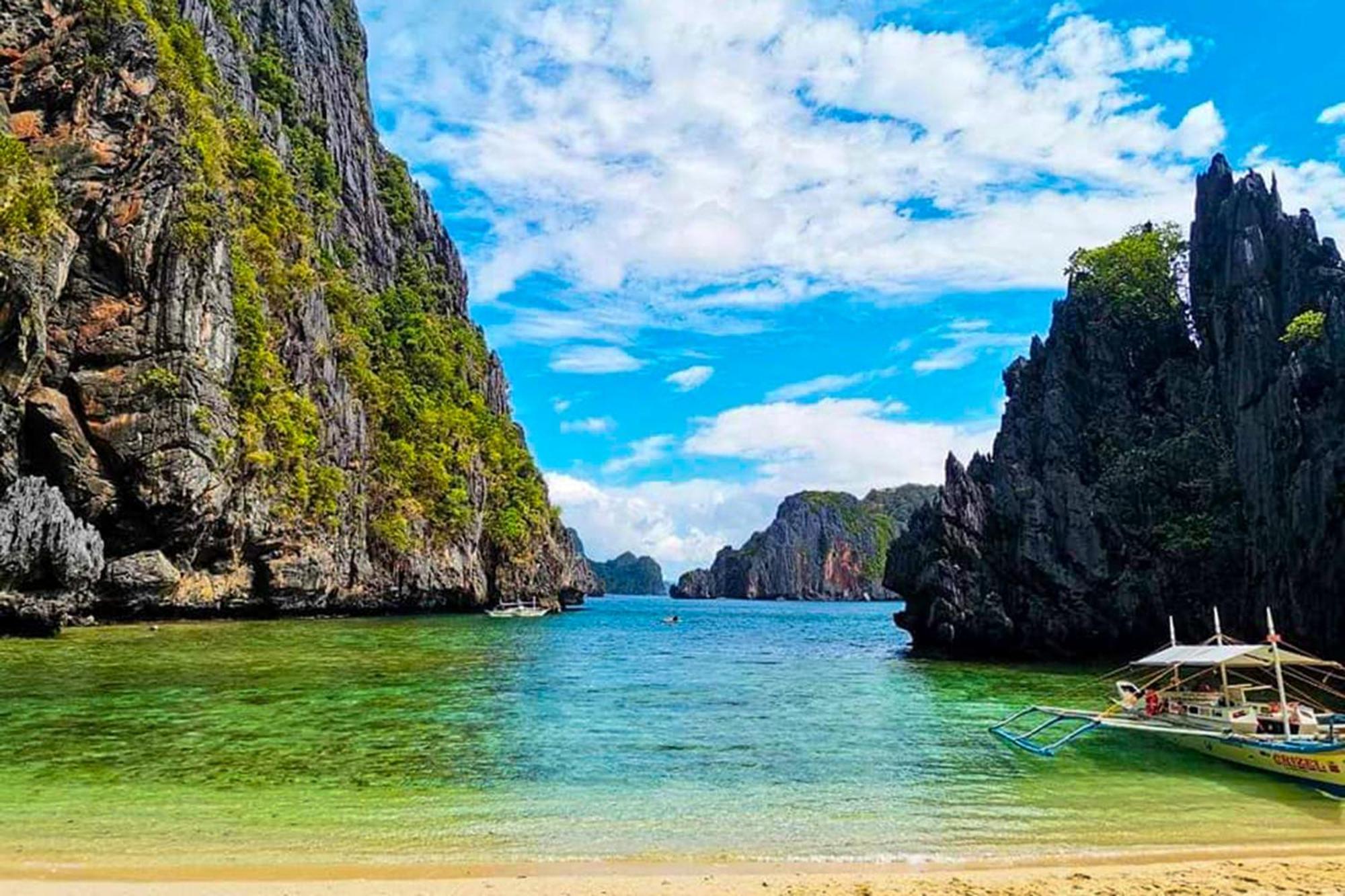 Mbg Travellers Inn Powered By Cocotel Puerto Princesa Ngoại thất bức ảnh